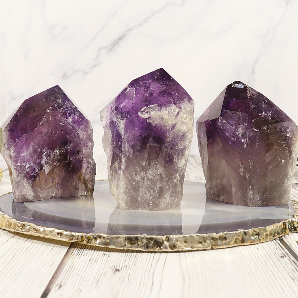 Amethyst with Smoky Phantoms Point Base Cut (Sold/lb)
